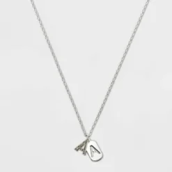Budget 😀 Crystal Sterling Plated Initial Tag Cut Out Pendant Necklace - A New Day™ Metallic Silver ⭐