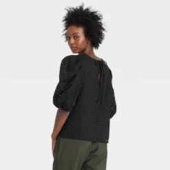 Coupon ✔️ Women's Short Puff Sleeve Eyelet Top - A New Day™ 🌟